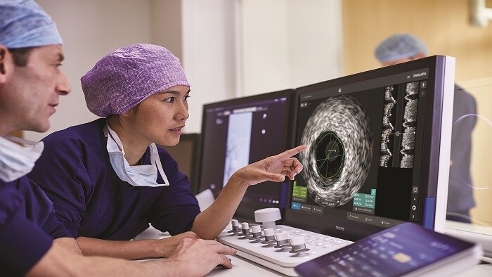 Doctors using IGT monitors