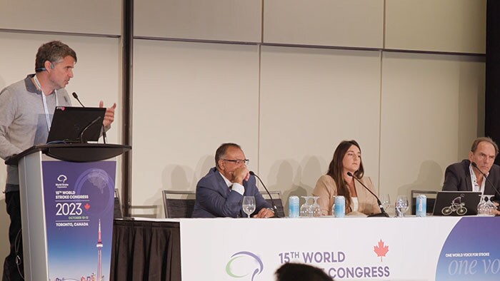 Professions discussing during symposium 