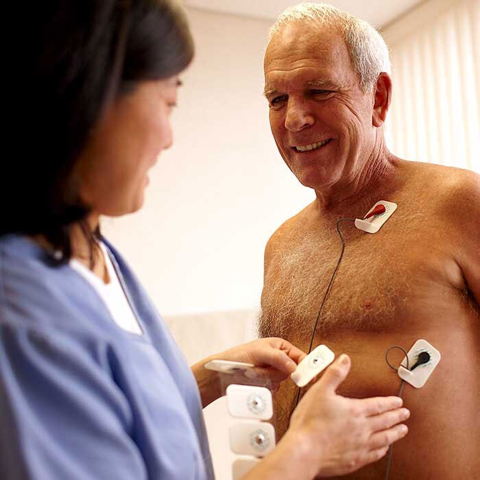 Doctor applying test pads