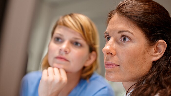 Photo of two clinicians