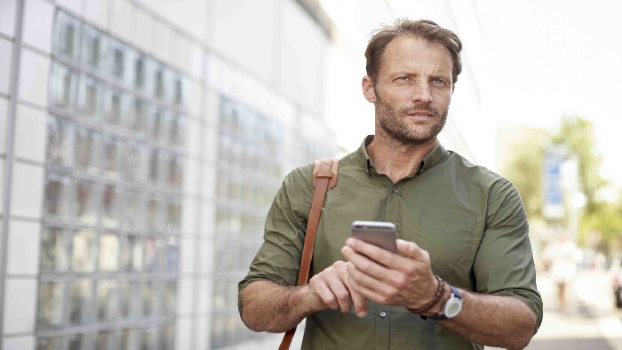 Man outside using phone