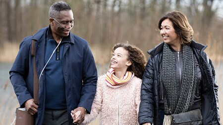 Image of family walking, flipped horizontally 