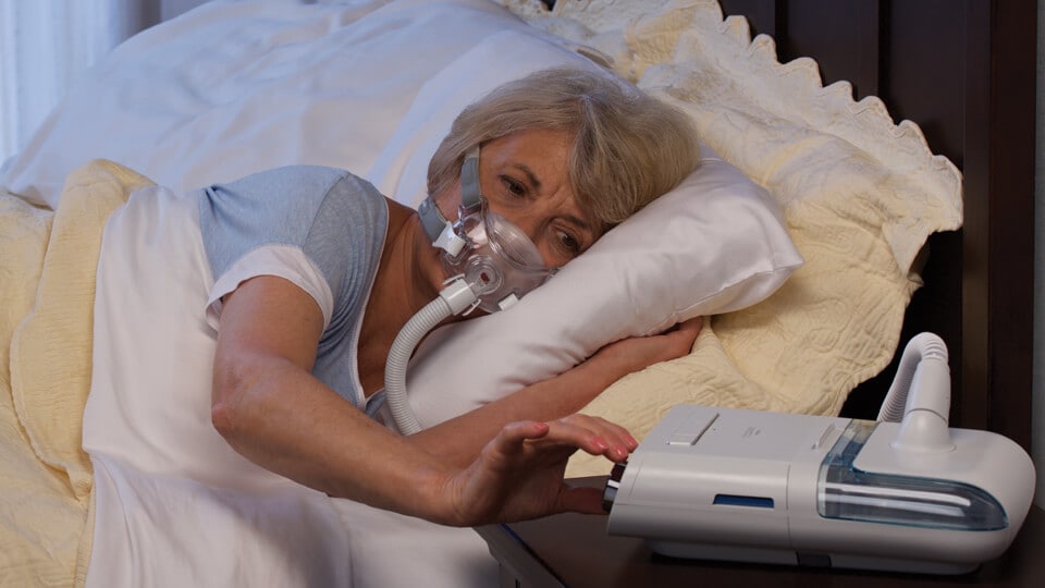 Sleep Apnea patient in bed