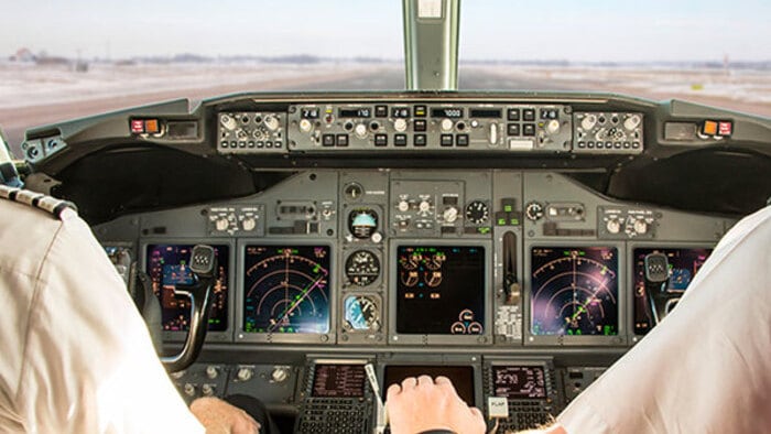Pilots in airplane cockpit