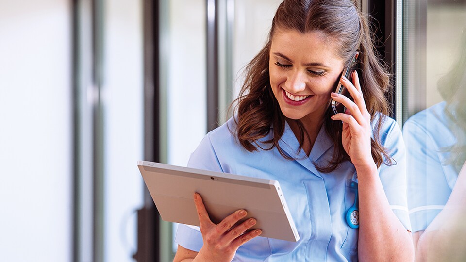 women talking to phone