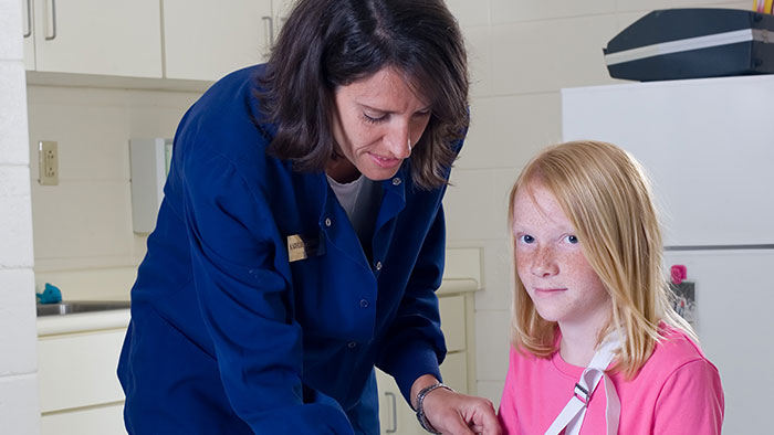 Child in nurse office