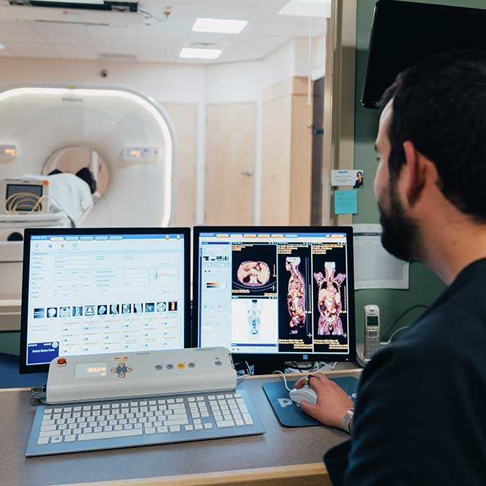 Radiology tech and MRI machine