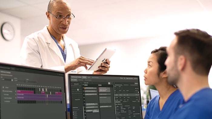 Doctor speaking with colleague