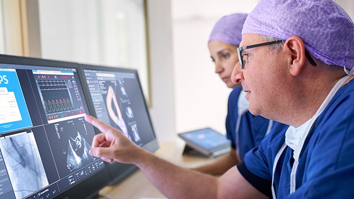 Doctor speaking with colleague