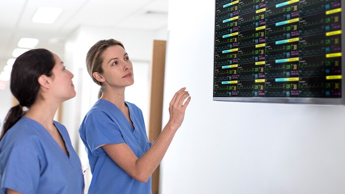 Patient and healthcare professional conversing