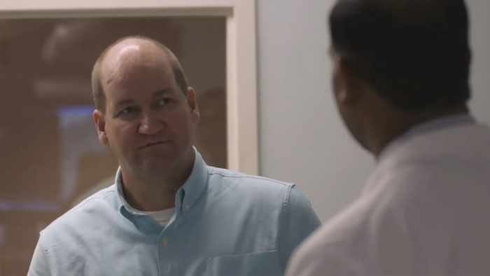 Carl having a visit with doctor