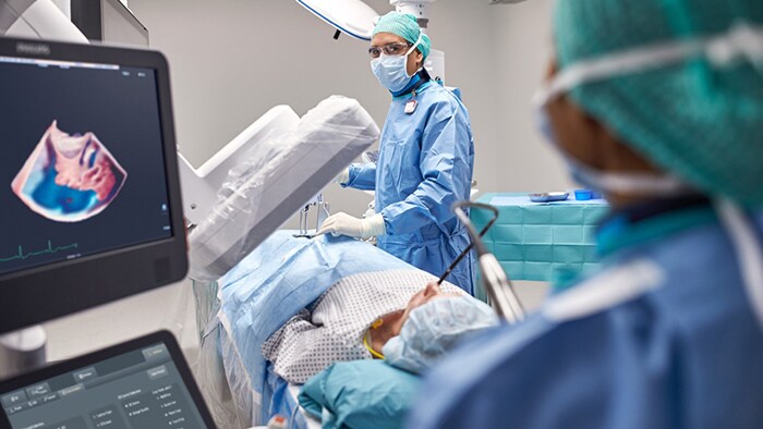 Doctors monitoring screen