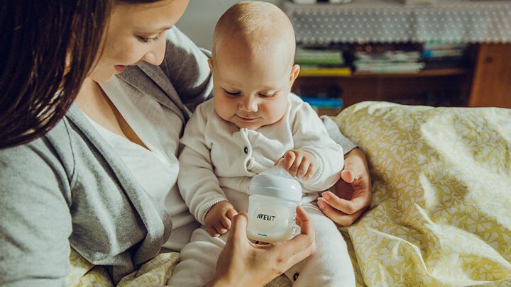 How to get a breastfed baby to take a bottle