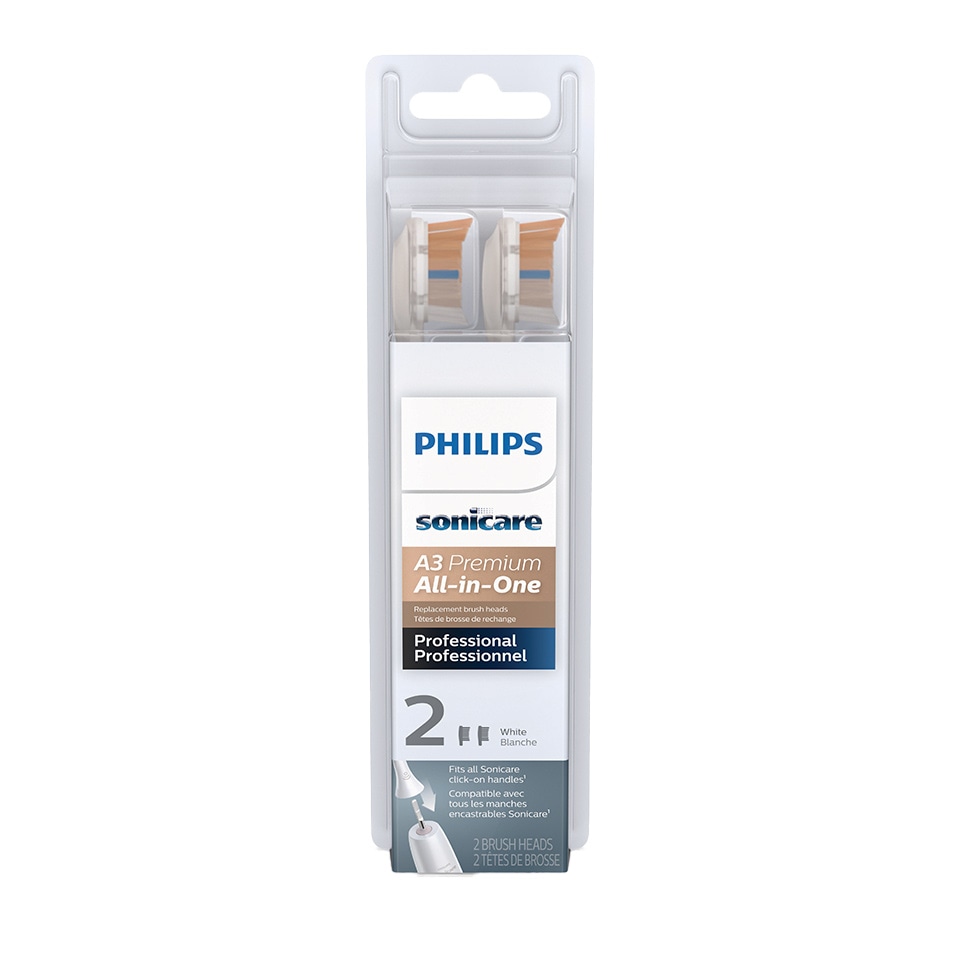 Close up of All-in-One brush head brushing teeth