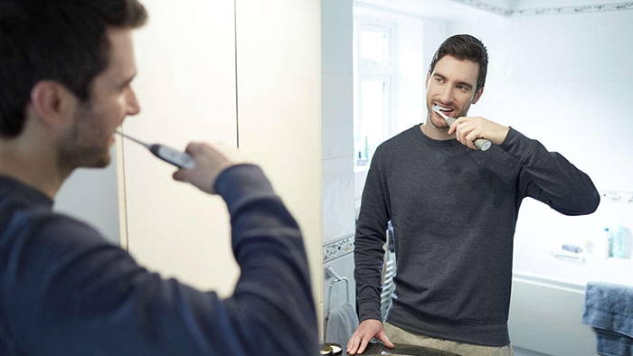 Comparison of Plaque and Gingivitis Reduction by Philips Sonicare FlexCare Platinum with Premium Plaque Control Brush Head and a Manual Toothbrush