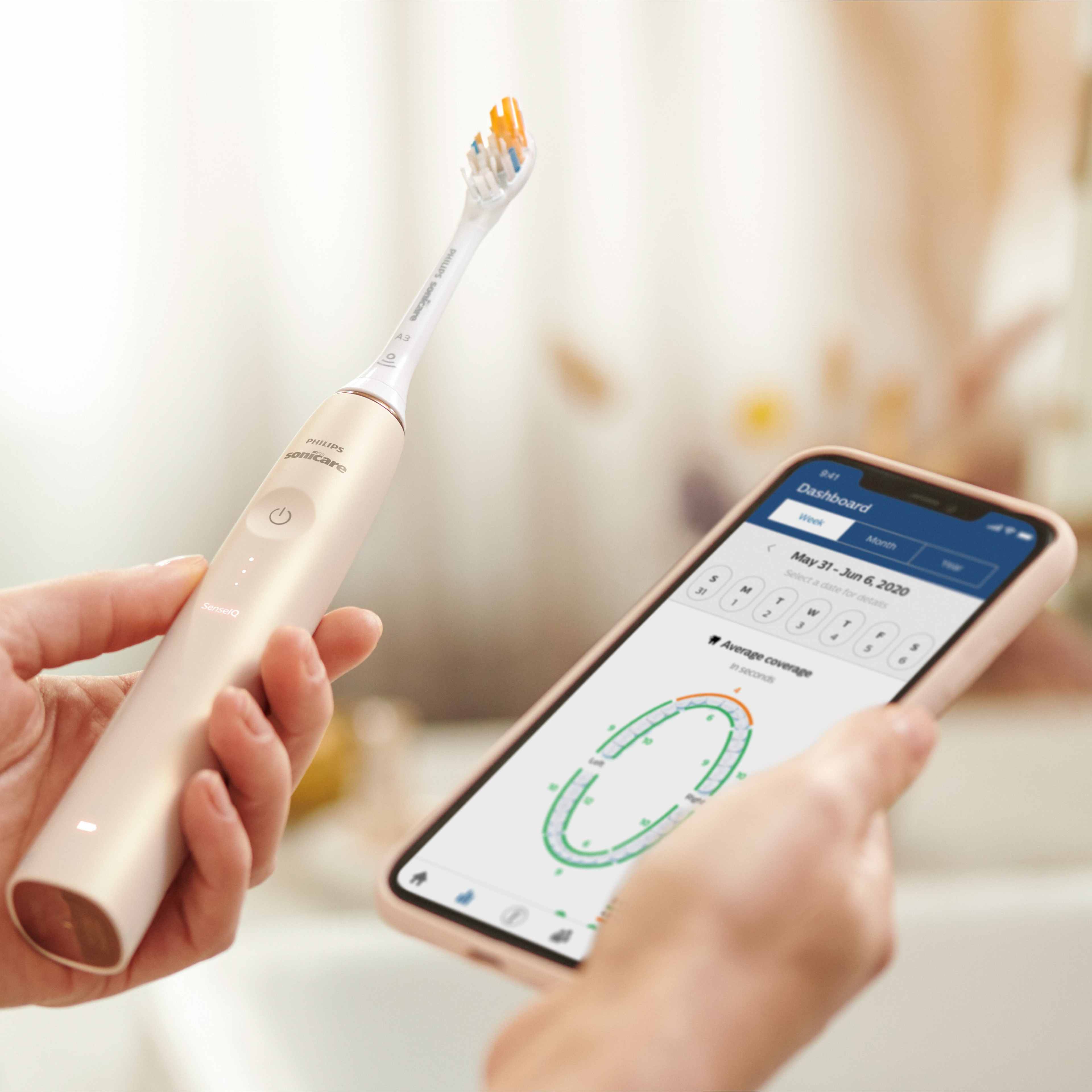 Woman smiling with toothbrush