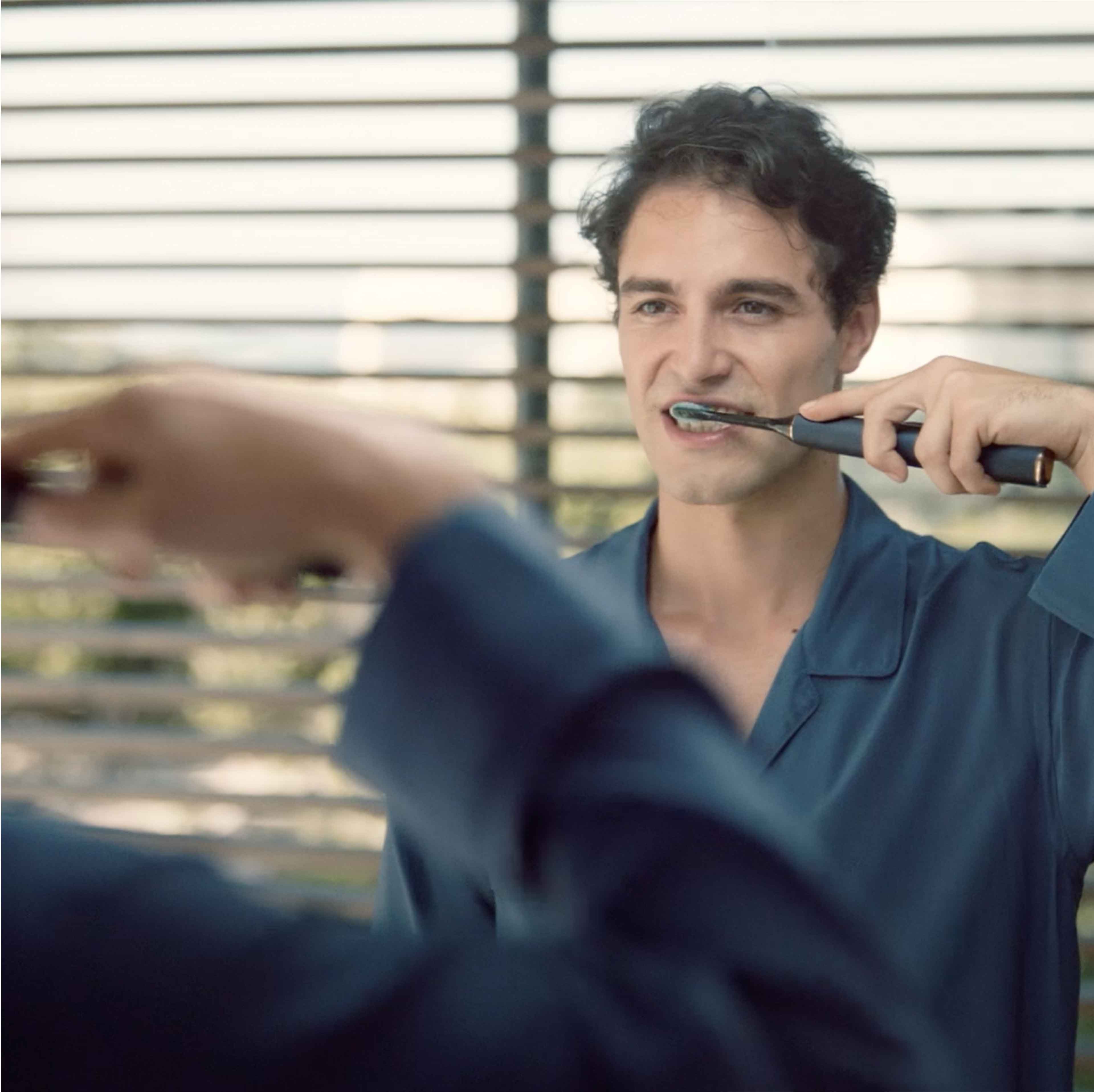 Man brushing his teeth