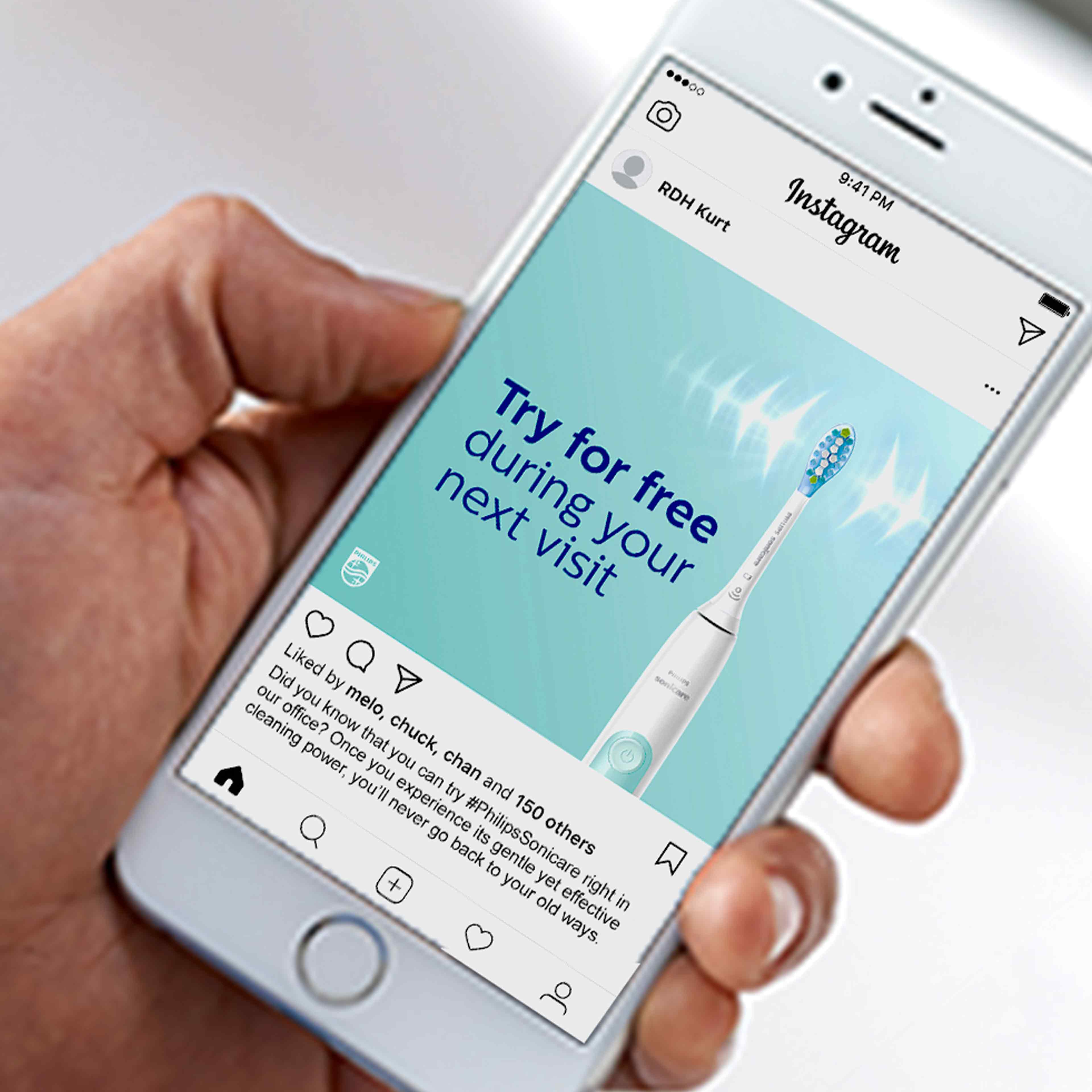 A hand holding a phone featuring a post about the in-office trial program