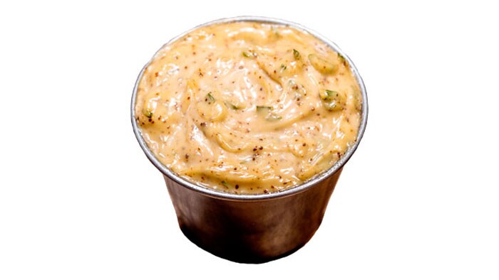 Chili and tarragon mayonnaise in ramekin