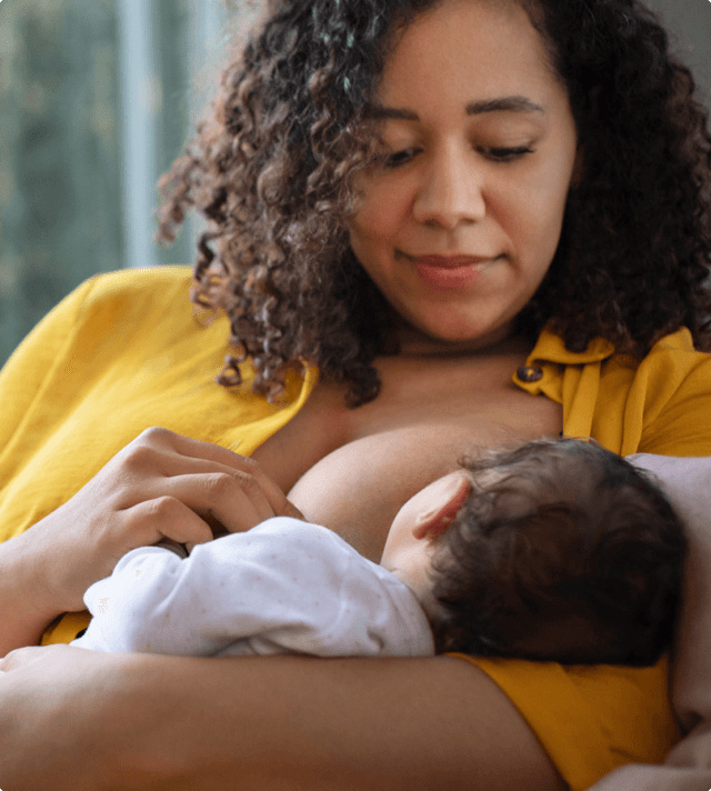 Mother breastfeeding baby