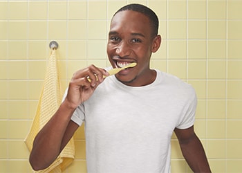 Man brushing teeth