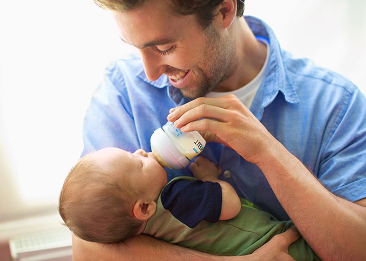 Baby coughing while deals feeding bottle