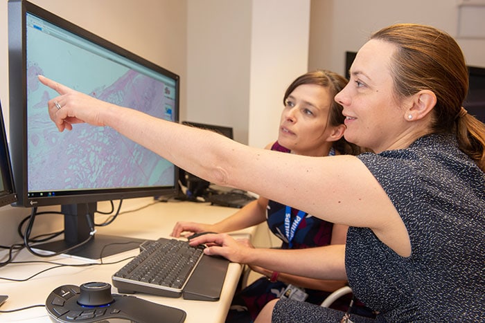 Download image (.jpg) Dr Lisa Browning and Professor Clare Verrill, Honorary Consultant in Cellular Pathology at Oxford University Hospitals working with Philips IntelliSite Pathology Solution�s Image Management System (opens in a new window)