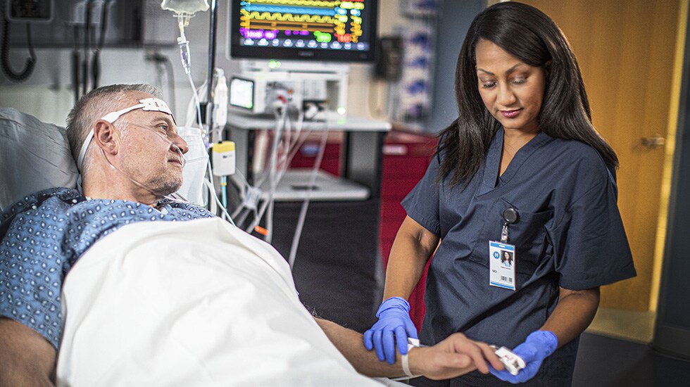 Doctor monitoring patient health