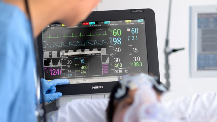 Philips MX550 IntelliVue Portable Bedside Patient Monitor with Shield - A Philips patient monitor in use