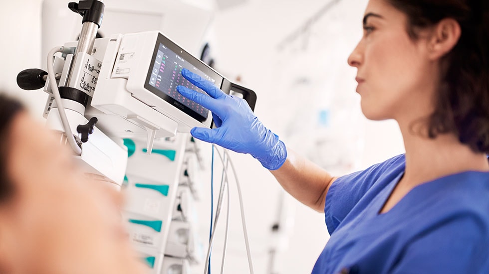 IntelliVue X3 patient-monitor in use - patient and nurse
